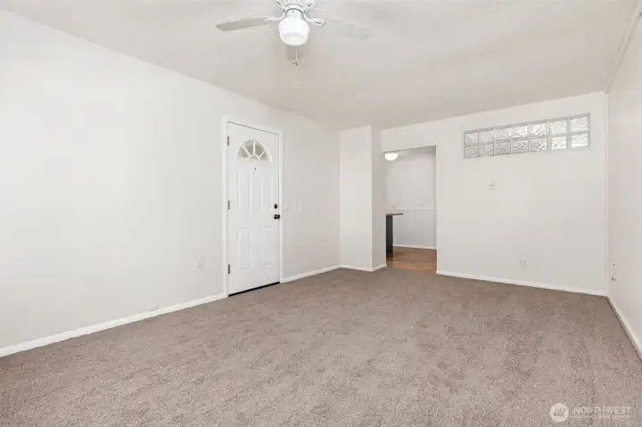 Family Looking Toward Kitchen Doorway