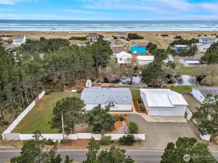 Large tripple wide manufactured home on .63 acres right outside of Surfside. No HOA - wonderful location near the beach!