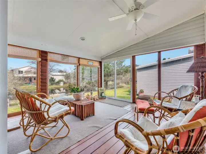 screened in, covered porch allows you to enjoy the outdoors while protecting you from the elements.