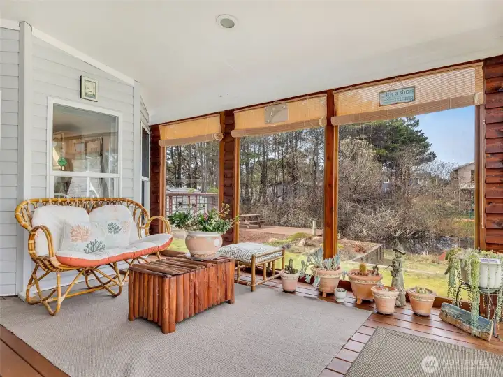 screened in, covered porch allows you to enjoy the outdoors while protecting you from the elements.