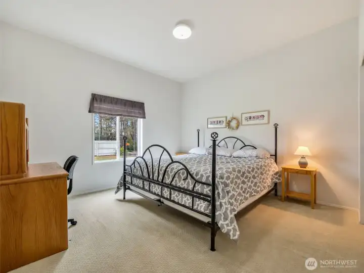 Bedroom #1 to the left of the entrance on the southwest side of the home.