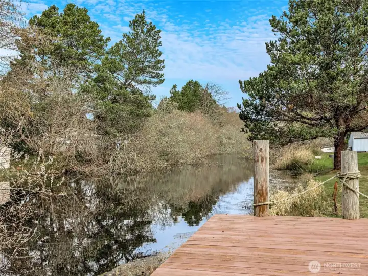 At this property you can enjoy the backyard, lagoon, firepit, fish cleaning station, dock and more! Also, added RV space with septic, water and power, to the south of the main home for guests.