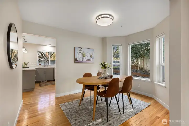 Formal Dining room with curved windows. This space wold also make a great home office.