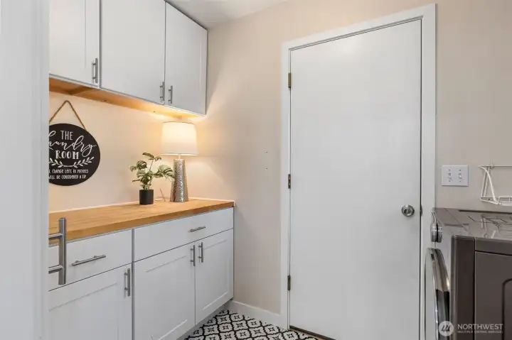 Laundry room storage added in 2021 with a   W &D combo