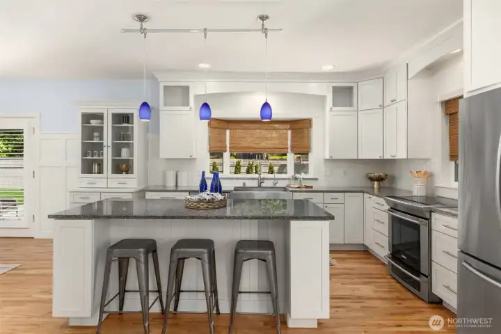 The bright and modern kitchen is the true heart of this home. The bright and modern kitchen is the true heart of this home.