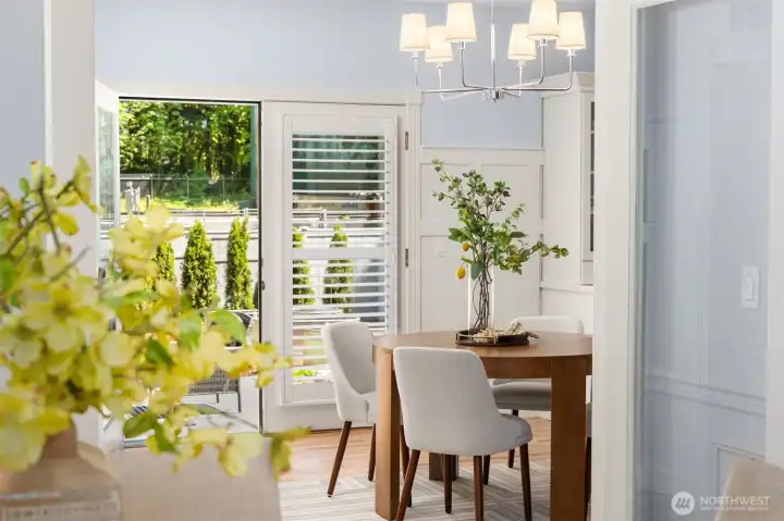 Back over to the informal dining area that has French doors out to the back deck and yard. Back over to the informal dining area that has French doors out to the back deck and yard.