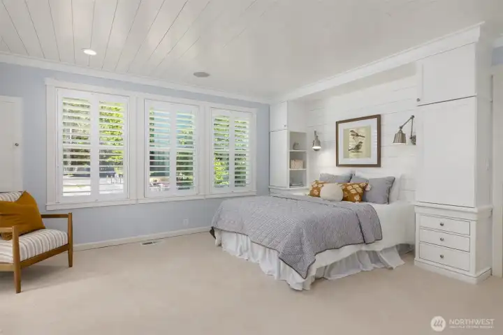The primary suite is spacious with two closets, one a walk-in, built-ins around the bed and a modern connected spa-like bathroom. Plus plantation shutters for nice privacy. The primary suite is spacious with two closets, one a walk-in, built-ins around the bed and a modern connected spa-like bathroom. Plus plantation shutters for nice privacy.