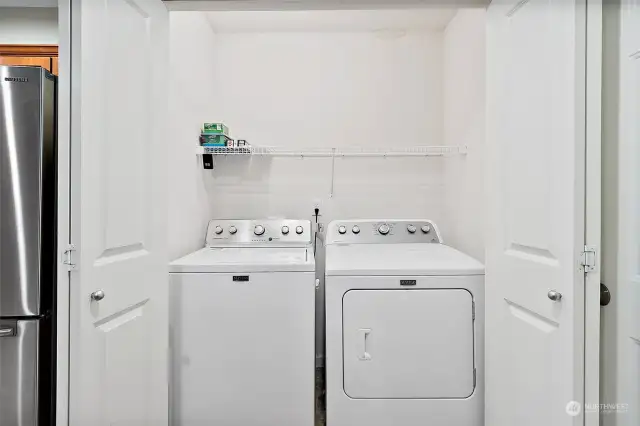 Laundry area off to side of kitchen.