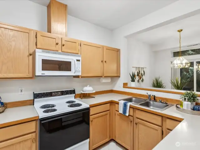 Bright open kitchen with eating space.