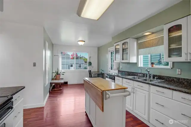 This darling kitchen has been tastefully updated.