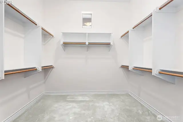 Primary walk-in closet-Upper