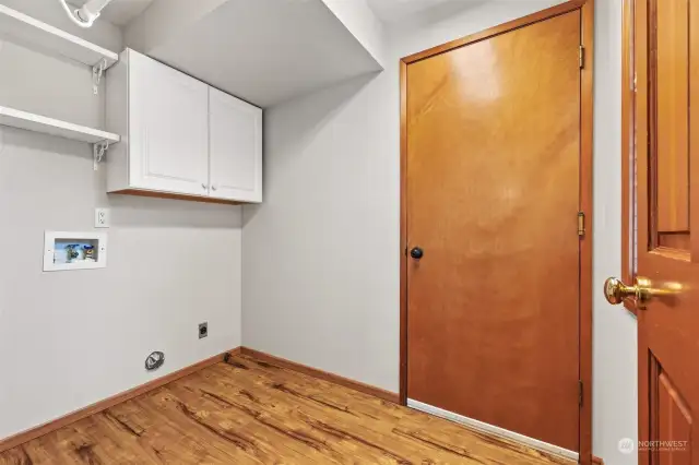 Laundry room with storage - both gas and electric hookup for dryer