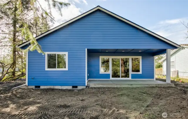 Covered back porch and large yard
