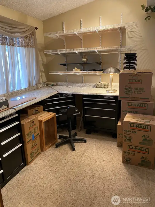 This is the second upstairs bedroom that can also be used as an office.