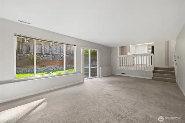 Spacious family room opens to the back patio.