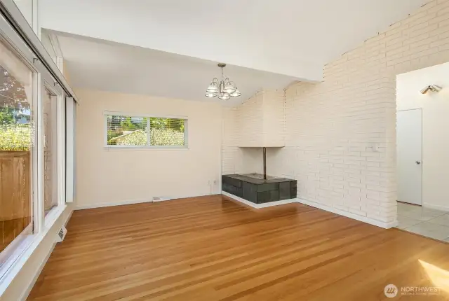 Hardwood floors gleam throughout the home.