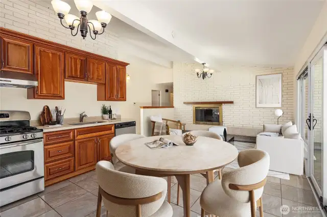 Virtual Staging of the open eat-in kitchen and family room spaces. There's so much spacious room!!