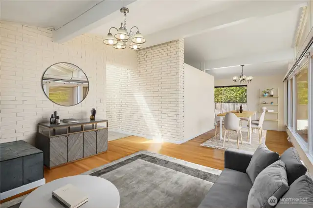 Virtual Staging of the open living room and dining room spaces. There's so much spacious room!!