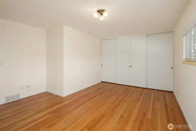 The spacious primary bedroom offers tons of room and flexibility.