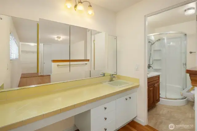 Original tile + modern updates create the perfect combination for the primary bathroom!