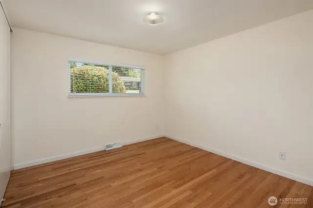 The second bedroom is spacious and private.