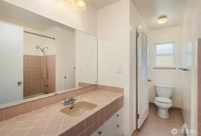 Original tile in excellent condition makes this second bathroom timeless in its appeal.