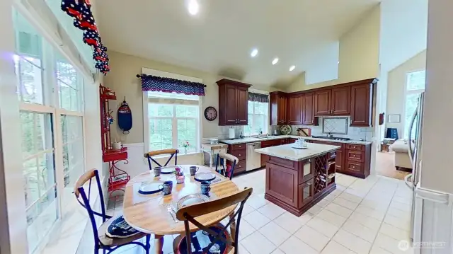 Eat-in kitchen has plenty of space for breakfast table.