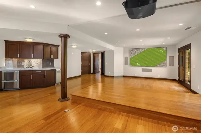 Lower Level great room with built in movie theatre and raised seating.
