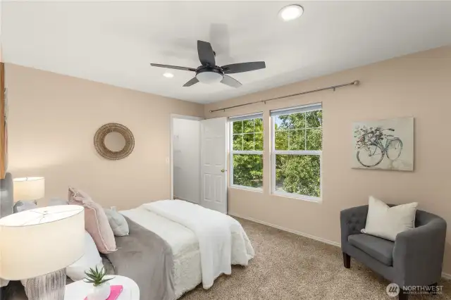 Upstairs second bedroom with walk in closet