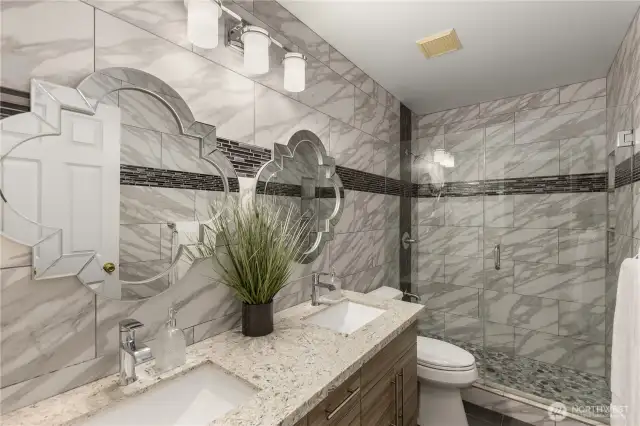 Upstairs hall bathroom with wall to wall tiles