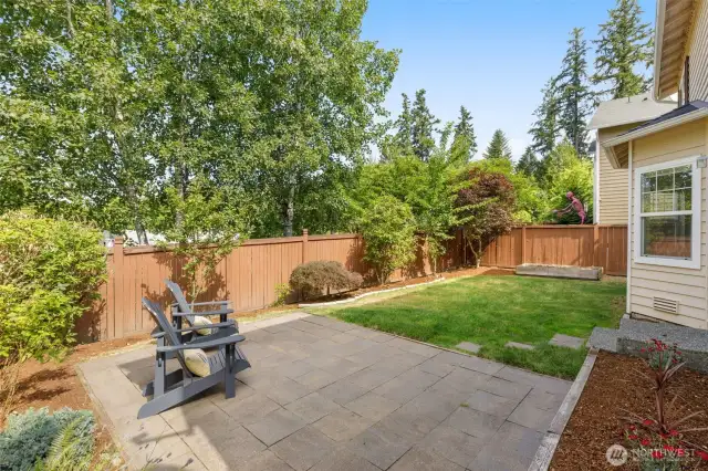Decent sized private backyard with paver patio for kids play and gardening