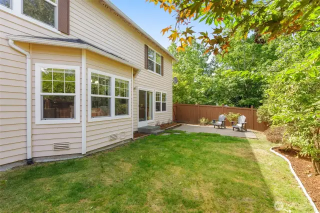Decent sized private backyard with paver patio for kids play and gardening