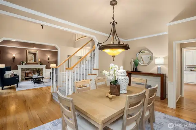 The flow of this home is open and inviting, featuring large entry ways and elegant touches with wainscotting, crown molding, wood floors and beautiful trim work throughout.  A relaxed elegance - perfection!
