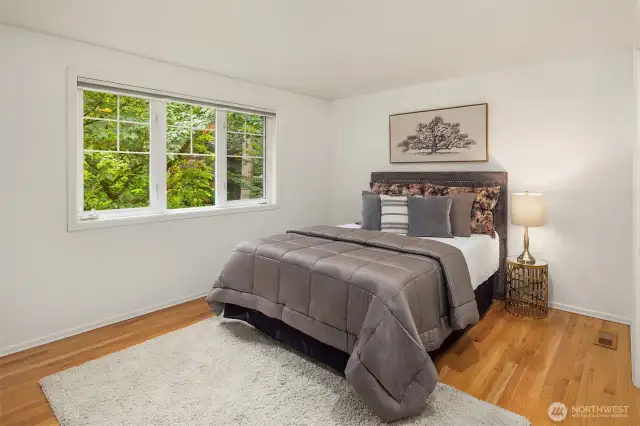 Bedroom #2 easily accommodates a queen-sized bed.  All closets are fully built out with fantastic storage.