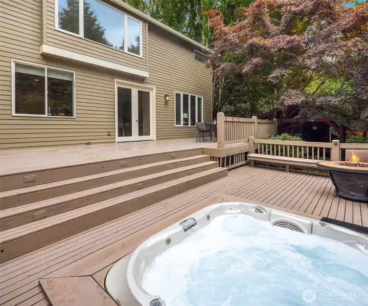 Coming out the French doors in the kitchen you can walk straight down to the hot tub tier, or head to the left and walk down the stairs to the gem of the outside oasis: the gazebo and the water fountain!