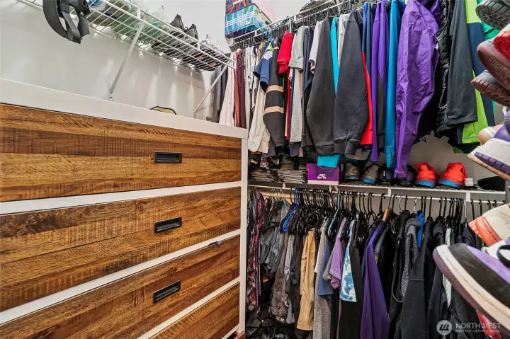 Walk in closet in primary bedroom