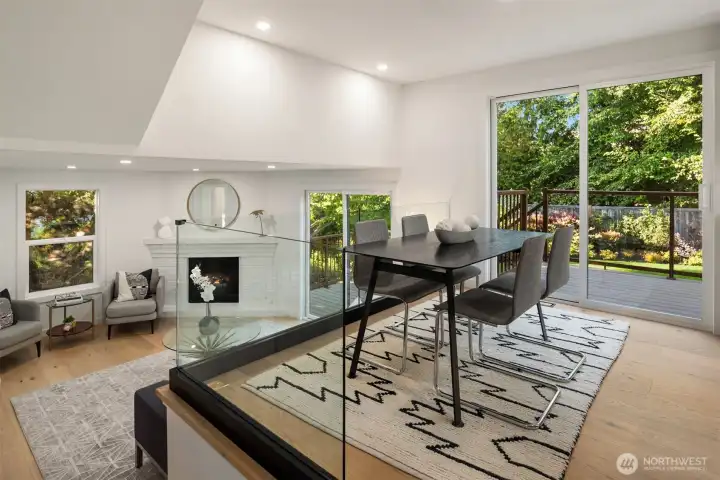 Open concept transition from kitchen to family room.