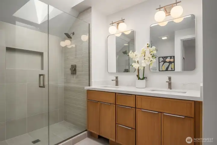 Master bath with full height designer tile.