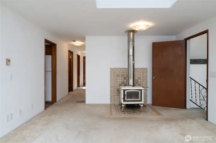 Additional heat supplied by wood stove.