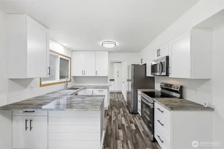 Kitchen with new cabinets, countertops and appliances
