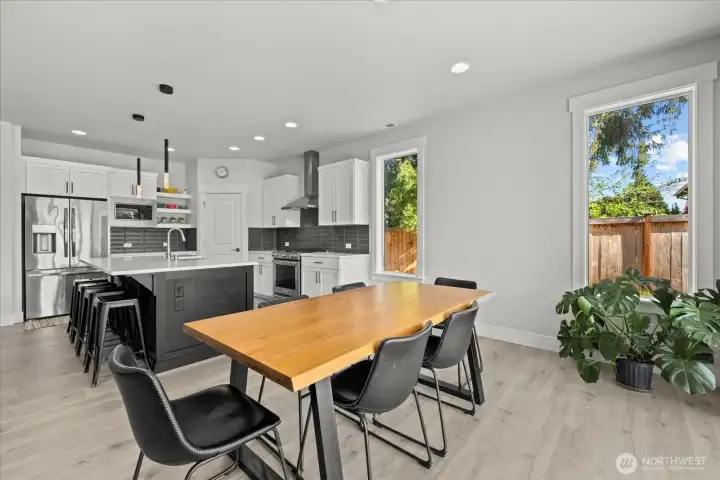 Large island adjacent to dining provides ample space.