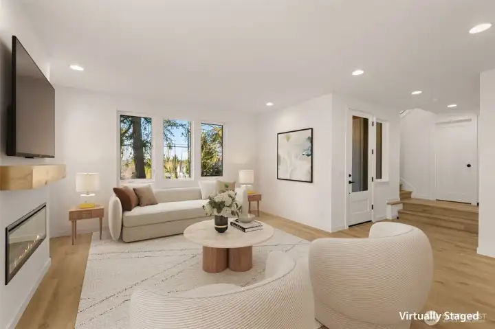 Spacious living area with designer lighting.