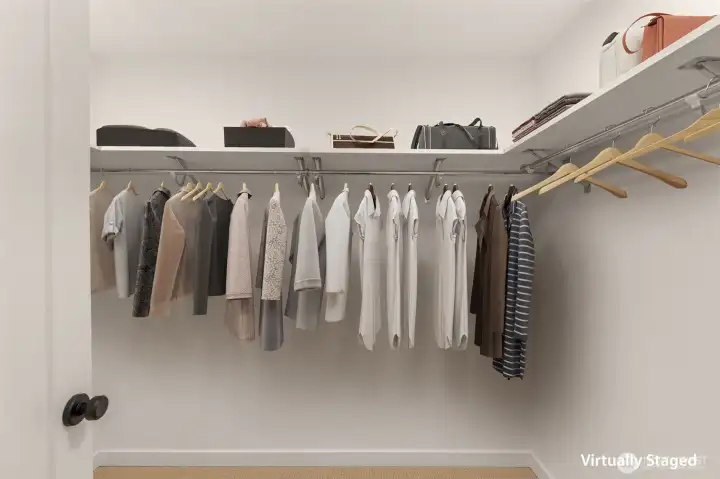 Primary spacious walk-in closet.