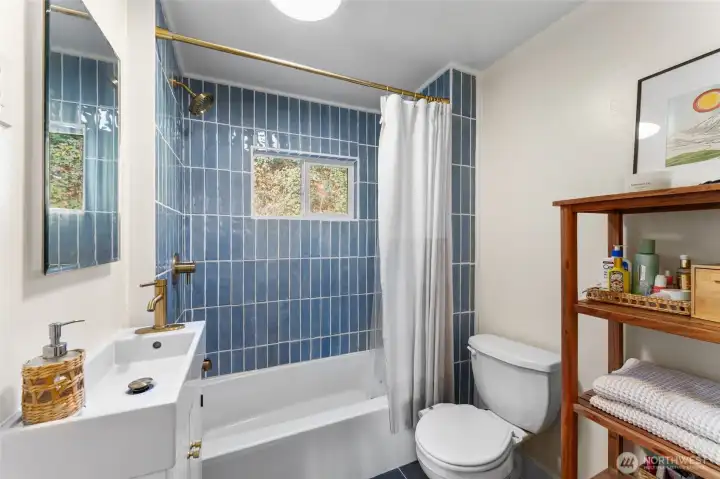 Full Bathroom with gold accents