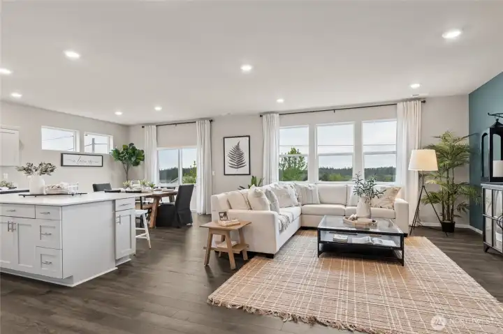 This open concept home is great for large gatherings.  Photos are for representational purposes only.  Colors and finishes may vary.