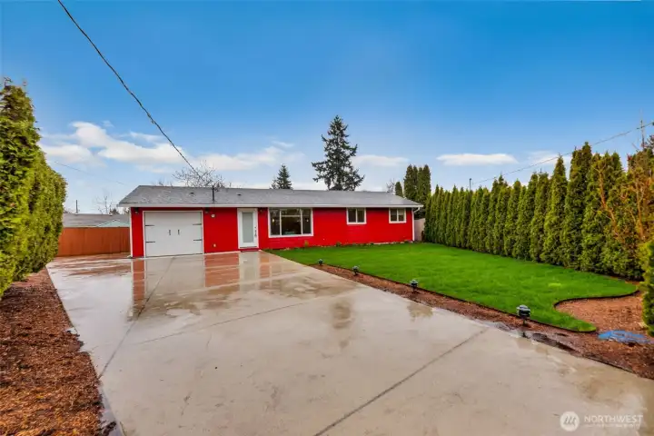 Updated concrerte driveway with plenty of space for outdoor parking