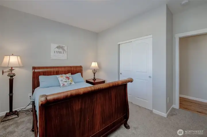 Guest bedroom #1 has cozy carpet flooring and lots of room to spare...