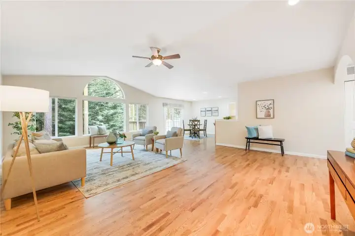 Living Room toward Dining Space and Kitchen and Deck