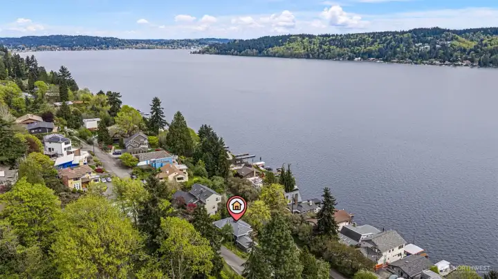 Walk to Matthews Beach Park and Lake City Beach along the trail.  A rare opportunity to own a peaceful lakeside retreat with timeless appeal and modern updates.