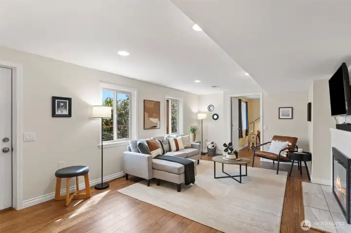 Family Room/Rec room/Media Room/Games Room—a great flexible space in the lower level. Separate from the main level with a pocket door at the bottom of the stairs.